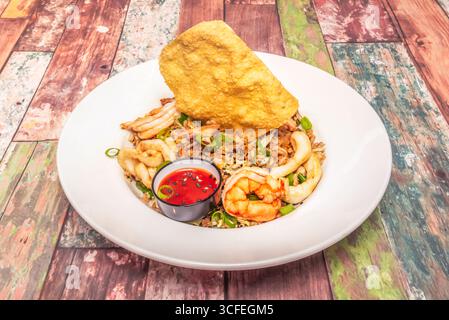 Northern chaufa with spicy chorizo, fried yuca, and cilantro, a Creole version that enhances the flavors of traditional chifa Stock Photo