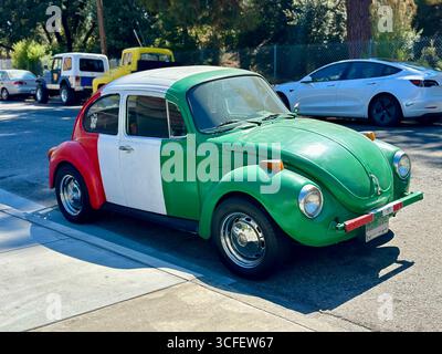 Classic Volkswagen Beetle Painted in Mexican Flag Colors Stock Photo