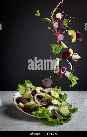 Flying Vegetable Salad in Levitation Stock Photo