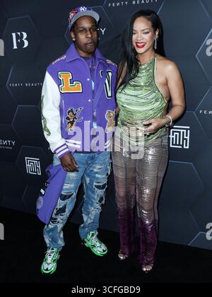 (FILE) Rihanna’s Clara Lionel Foundation to Spotlight Caribbean Art With New Mellon Foundation Partnership. HOLLYWOOD, LOS ANGELES, CALIFORNIA, USA - FEBRUARY 11: American rapper A$AP Rocky (ASAP Rocky, Rakim Athelaston Mayers) and pregnant girlfriend/Barbadian singer, actress, businesswoman, and humanitarian Rihanna (Robyn Rihanna Fenty) wearing The Attico arrive at the Fenty Beauty And Fenty Skin Celebration Hosted By Rihanna held at Goya Studios on February 11, 2022 in Hollywood, Los Angeles, California, United States. (Photo by Xavier Collin/Image Press Agency) Stock Photo