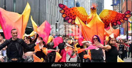 Manchester, UK, 23rd August, 2025. Bird themed float and dancers lead the parade. LGBTQ+ Pride Parade, Manchester, UK. Organisers say: 'Manchester Pride Parade celebrates Love! Love has long been a source of strength and resilience for LGBTQ+ people. In the face of historical and ongoing discrimination, love has helped queer people have the courage  to be themselves.' Credit: Terry Waller/Alamy Live News Stock Photo