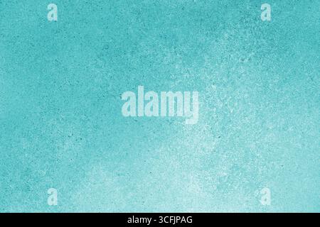 Abstract grungy texture background with different shades of turquoise color. Painted canvas, concrete surface, studio backdrop, grainy textured effect Stock Photo