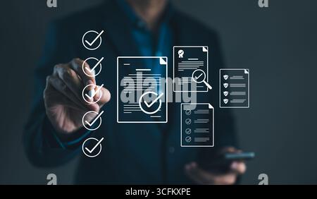 Businessman using pen to tick correct sign mark in checkbox for quality document control checklist and business approve project concept. Check mark, Stock Photo