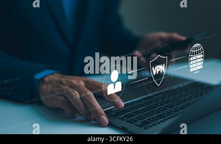 Virtual private network encryption connection concept. Using VPN for secure internet access. A businessman securely accesses the internet through VPN Stock Photo