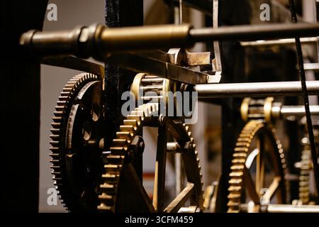 Old clock mechanism, clock gears, close up. Stock Photo