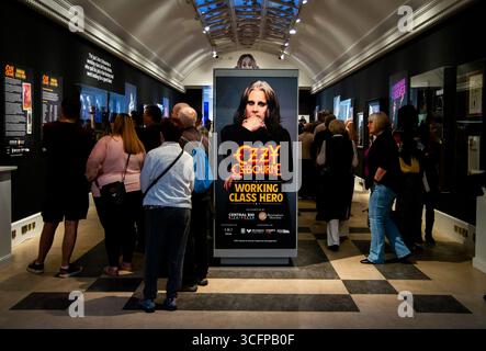 People looking around the Ozzy Osbourne - Working Class Hero, exhibition inside the Birmingham Museum and Art Gallery. Stock Photo
