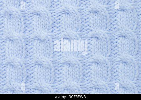 blue knitted wool texture. baby plaid seamless pattern. Desktop wallpaper pigtail knitting Stock Photo