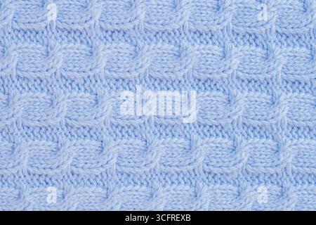 blue knitted wool texture. baby plaid seamless pattern. Desktop wallpaper pigtail knitting Stock Photo