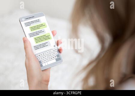 Woman texting with phone outdoors. Text message with smartphone. sms messaging chat. chatting with friend Stock Photo