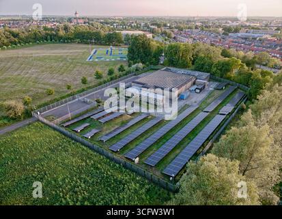 Aerial view of small local data center in the Netherlands with a lot of solar panels, online cloud storage locally Stock Photo