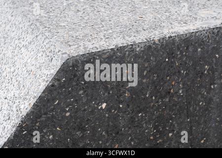 Edge of Grey Terrazzo block creates space of black and white geometric shape Stock Photo