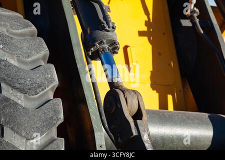 Frontal bulldozer loader. Yellow excavator close up. Stock Photo