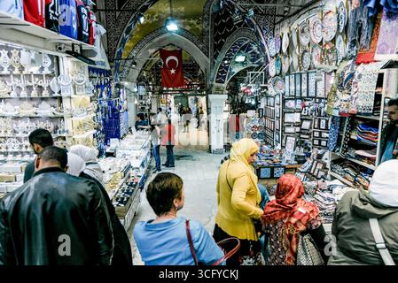 Istanbul, Turkey, 7 May 2018, Eastern Grand Bazaar market sells local traditional dishes, plates and peas on counter in store Stock Photo