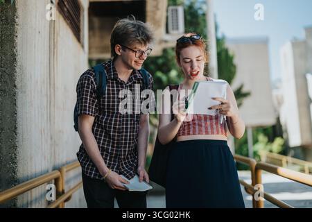 Students Collaborating Outdoors on a School Campus Stock Photo
