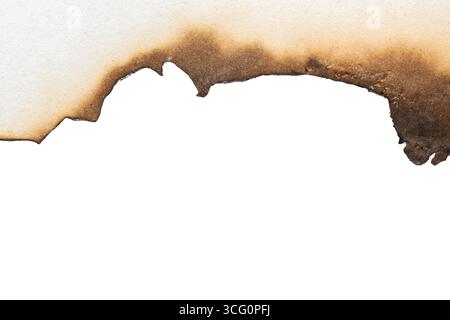 Fire burned white paper edges background texture isolated on white background. Stock Photo