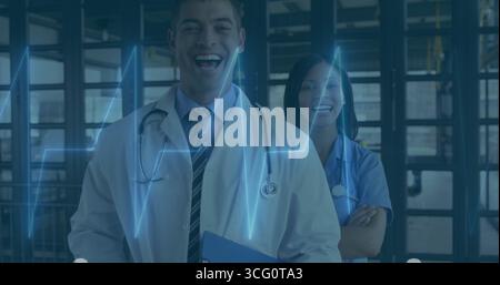 Smiling physician holding clipboard and nurse crossing arms in glass corridor, with ECG overlay Stock Photo