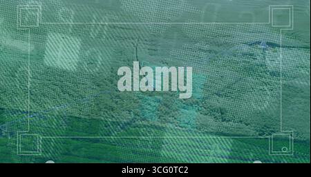 Displaying dense forest canopy over hills through HUD grid frame with blue contours, node markers Stock Photo