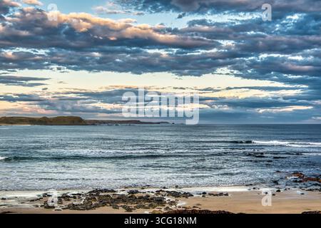 The dramatic late afternoon sky over the Bass Straight at the Phillip Island Nature Park in Australia. Stock Photo