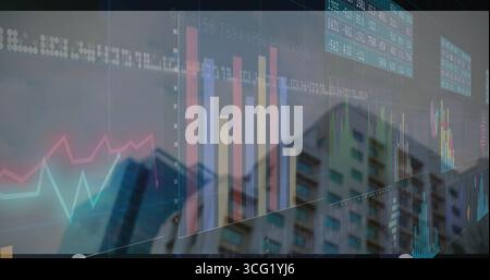 Projecting translucent bar chart rising on city residential facade, with line graphs and stock data Stock Photo
