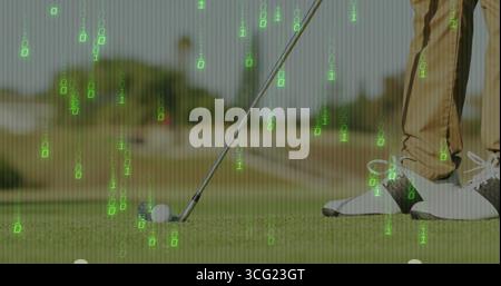 Golfer in tan pants positioning putter behind golf ball on green with code overlay, copy space Stock Photo