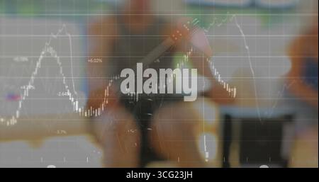 Recording finance creator presenting stock chart overlay in home office, with DSLR camera and mic Stock Photo