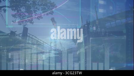 Displaying tower crane rising above scaffolding at construction site with financial chart overlays Stock Photo