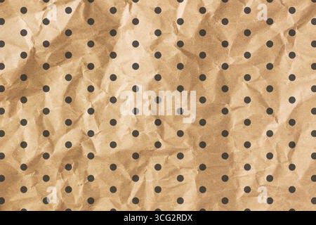 Crumpled gold paper background texture. Brown crumpled paper background Stock Photo
