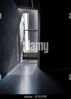 Abstract arts of Interior Architecture, a Chair at the corner, full frame Window brought Natural lights from outside to inside, created Shade and Shad Stock Photo