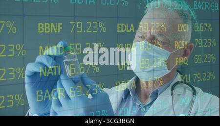 Examining doctor wearing mask, nitrile gloves and stethoscope holding vial in lab, with ticker data Stock Photo