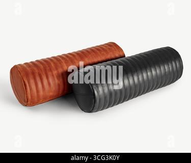 Two decorative leather bolster pillows resting on white background Stock Photo