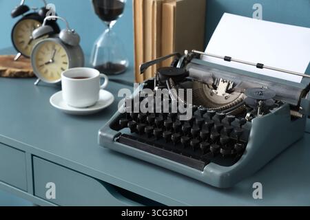 Vintage typewriter on table in office, closeup Stock Photo