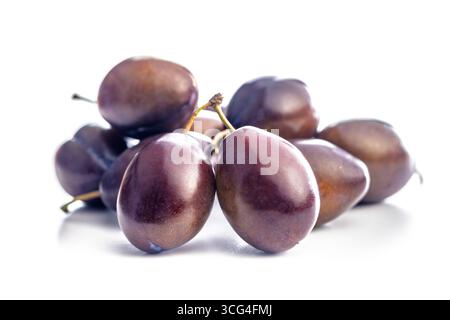 Ripe plums isolated on a white background. Stock Photo