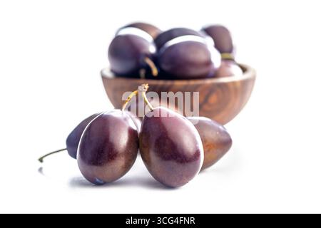 Ripe plums isolated on a white background. Stock Photo