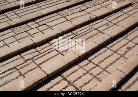 Texture background of the old granite pavement footpath in Mostar, Bosnia, Europe. Stock Photo