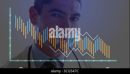 Presenting mature doctor wearing white lab coat and stethoscope in studio with overlaid data charts Stock Photo