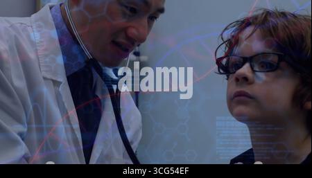 Physician wearing white coat using stethoscope examining boy in exam room, DNA overlaying Stock Photo