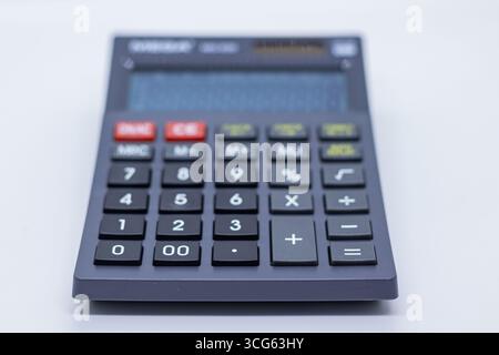 Simple and compact basic calculator designed for students and shopkeepers. Ideal for everyday math calculations, budgeting. Stock Photo