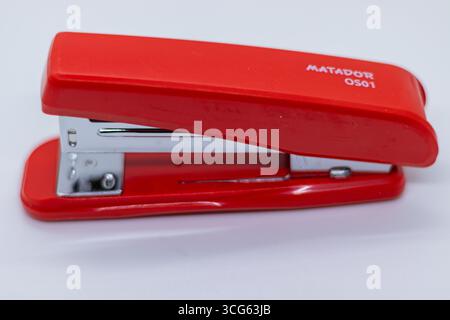 Black office stapler machine on white background. Stock Photo