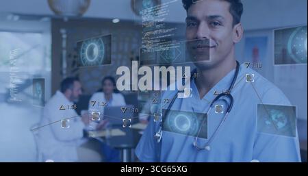 Presenting doctor in blue scrubs reviewing patient data panels in hospital meeting room, copy space Stock Photo
