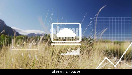 Displaying laptop outline overlaying grassland plain, with cloud icon, line graph and grid overlay Stock Photo
