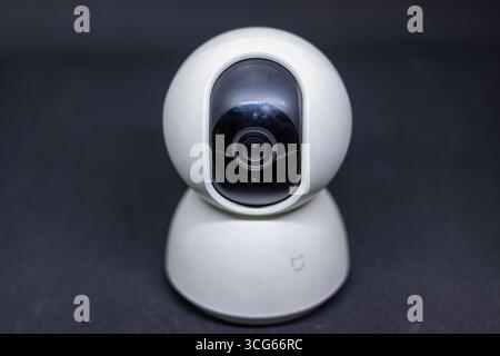 Compact CCTV security camera designed for indoor surveillance, isolated on a clean background. Ideal for home, office, or business use. Modern, discre Stock Photo