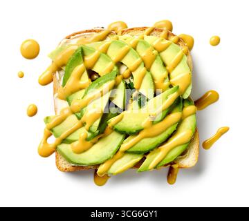 healthy breakfast sandwich with sliced avocado and mango sauce isolated on white background, top view Stock Photo
