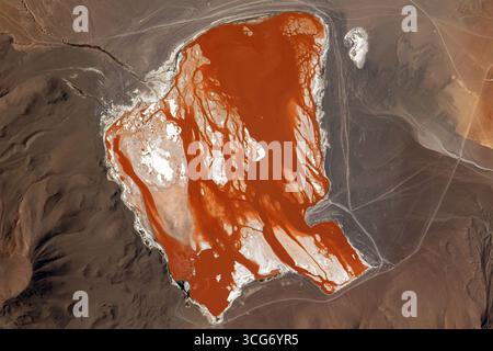 Laguna Colorada (Red Lagoon) shows off its vibrant red-brown colour as the International Space Station soared above Bolivia. Located in the Bolivian Andes Mountains, the salt lake gets its bright hues from algae that thrive in the water. Sept. 7, 2023 . The Andes are the longest continental mountain range in the world, forming a continuous highland along the western edge of South America.   An optimised version of an original NASA image: Credit NASA/JSC/AMogensen Stock Photo