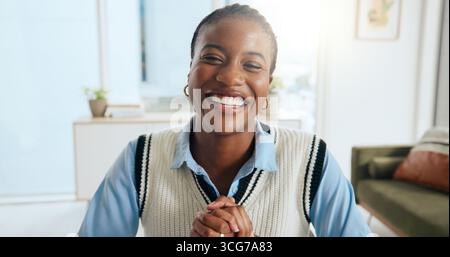 Remote work, black woman and laugh on video call in home for online meeting or virtual interview. Funny freelancer, portrait and webinar with internet Stock Photo