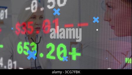 Examining lab coat doctor using stethoscope on seated patient at clinic, with financial overlay Stock Photo