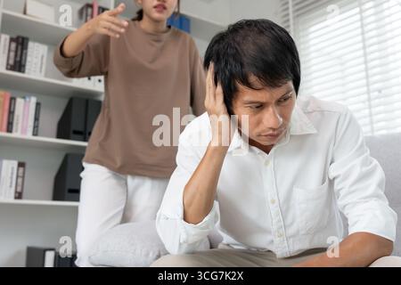 Divorce. quarrel between a husband and wife. Couples desperate and disappointing after marriage. Divorce document, upset and frustrated after conflict Stock Photo