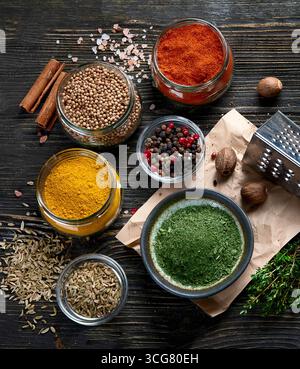 Various  spices for cooking on rustic wooden background. Stock Photo