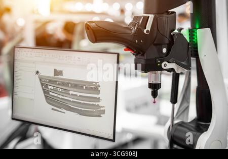 Close up touch probe of Automatic Coordinate measurement machine by CMM, Inspection dimension aluminum automotive parts by cnc programing control, hig Stock Photo
