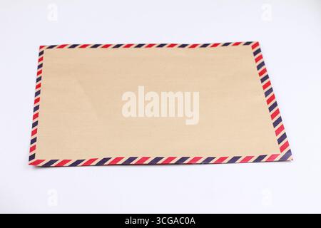 Antique envelope isolated on white background. Stock Photo
