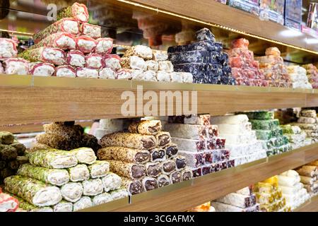 Display of various types of pastries and candies. There are many different colors and shapes Stock Photo
